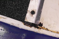 Slight evidence of rusty seam in one wheel arch